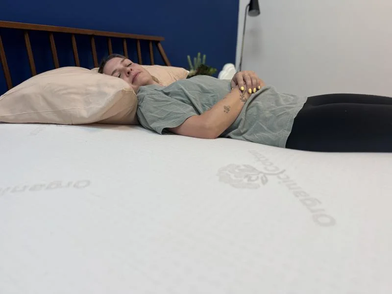 Our tester with the Brooklyn Bedding 3-inch Latex Topper