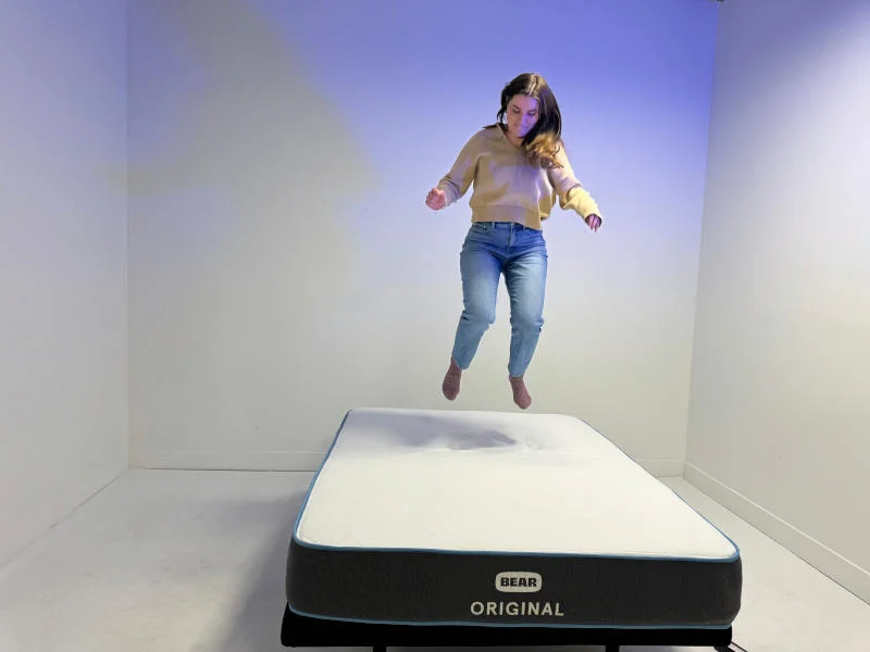 Our product tester evaluating the durability of the Bear Original Mattress