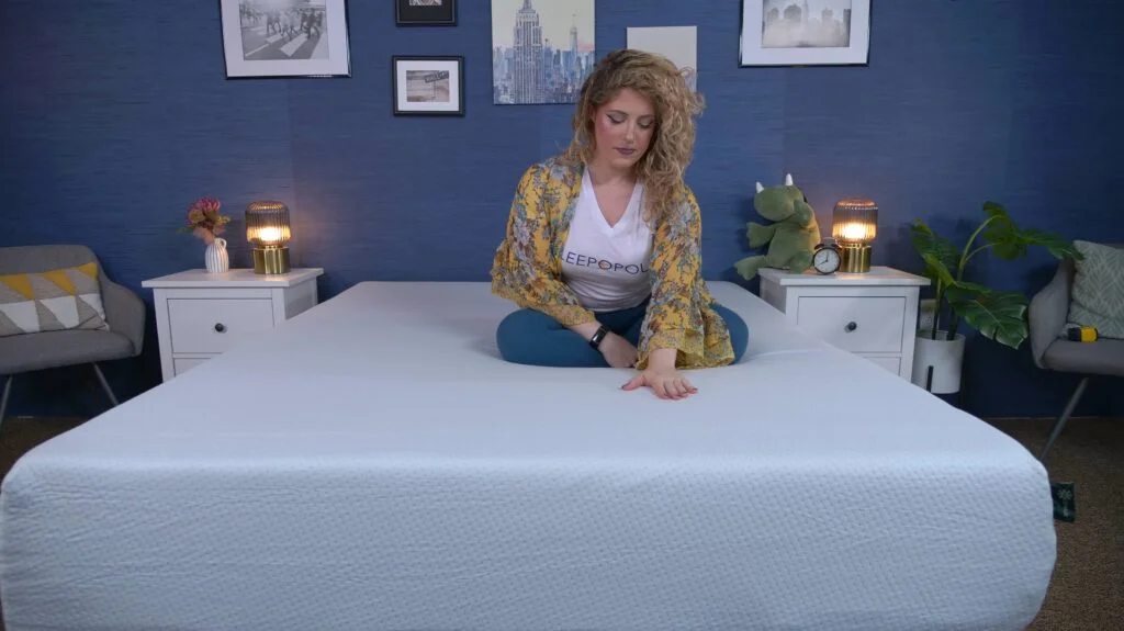 Nichole testing the Zinus Green Tea Memory Foam mattress.