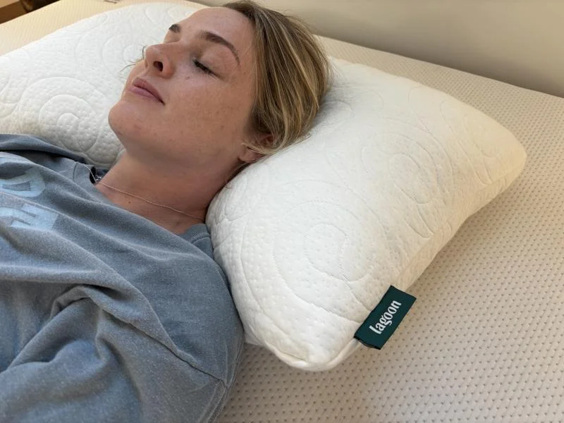 Our tester looking very cozy with The Otter pillow