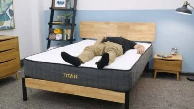 A person back sleeping on the Titan Plus mattress by Brooklyn Bedding