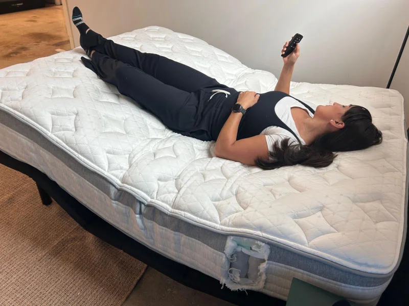 Our tester tries the zero gravity position on the Brooklyn Bedding Ascension Luxe  Adjustable Base.