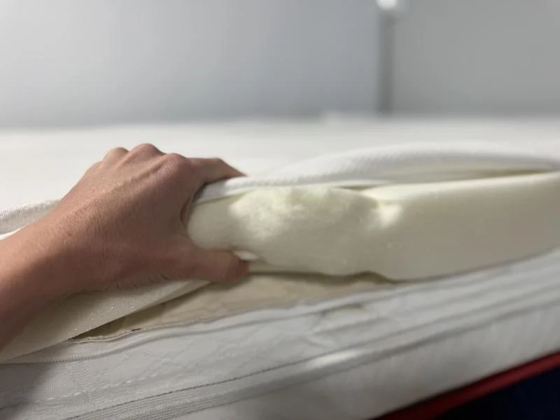 Squeezing the foam in a TEMPUR-Pedic TEMPUR-Adapt Topper