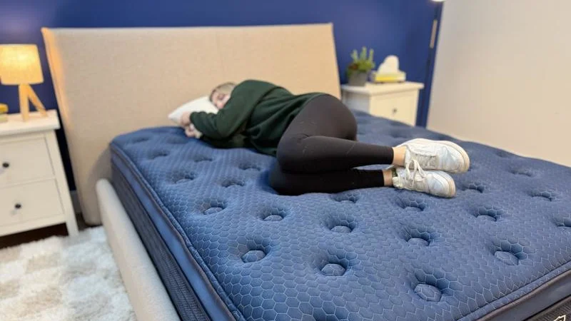 Our tester side sleeping on the Brooklyn Bedding Signature Hybrid Mattress
