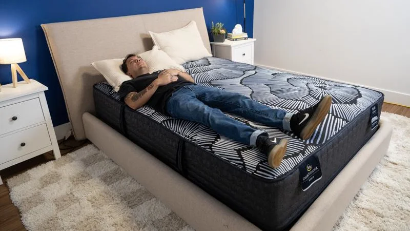 Full body edge support test of the Serta Perfect Sleeper X Mattress