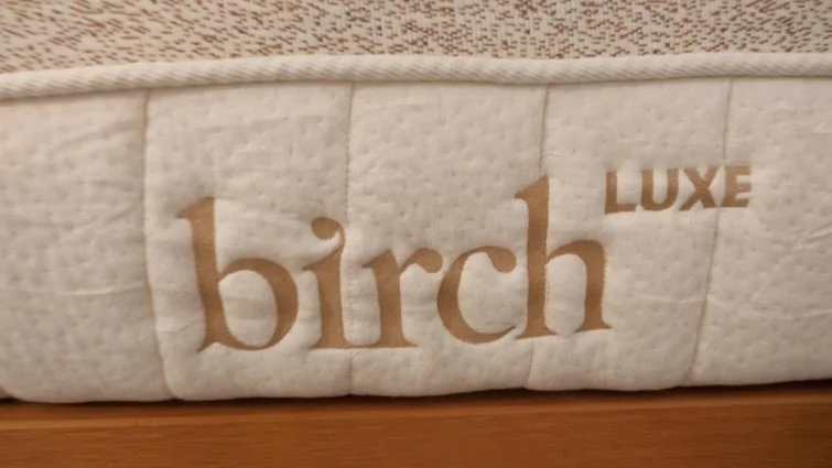 The logo on a Birch Luxe Natural Mattress