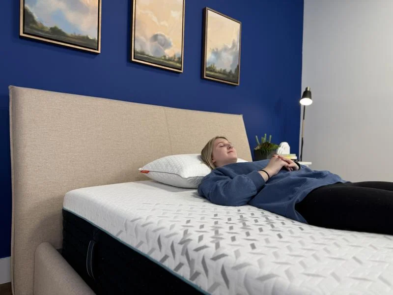 Our tester back-sleeping on the Nectar Premier Hybrid Mattress