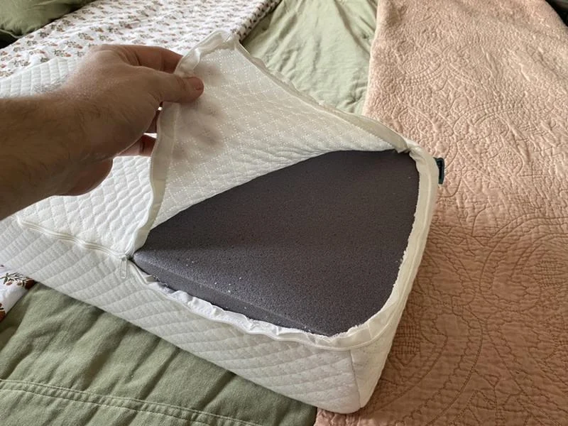 Looking inside an unzipped Side Cube pillow.