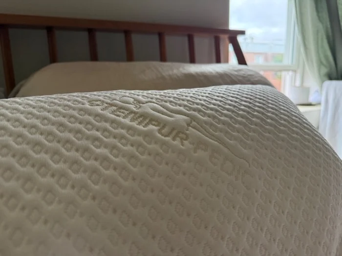 A closeup of the cover of the Tempur-Pedic Body Pillow.