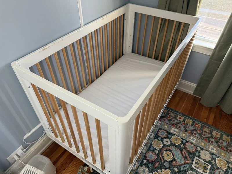 moonlight slumber little dreamer in a crib