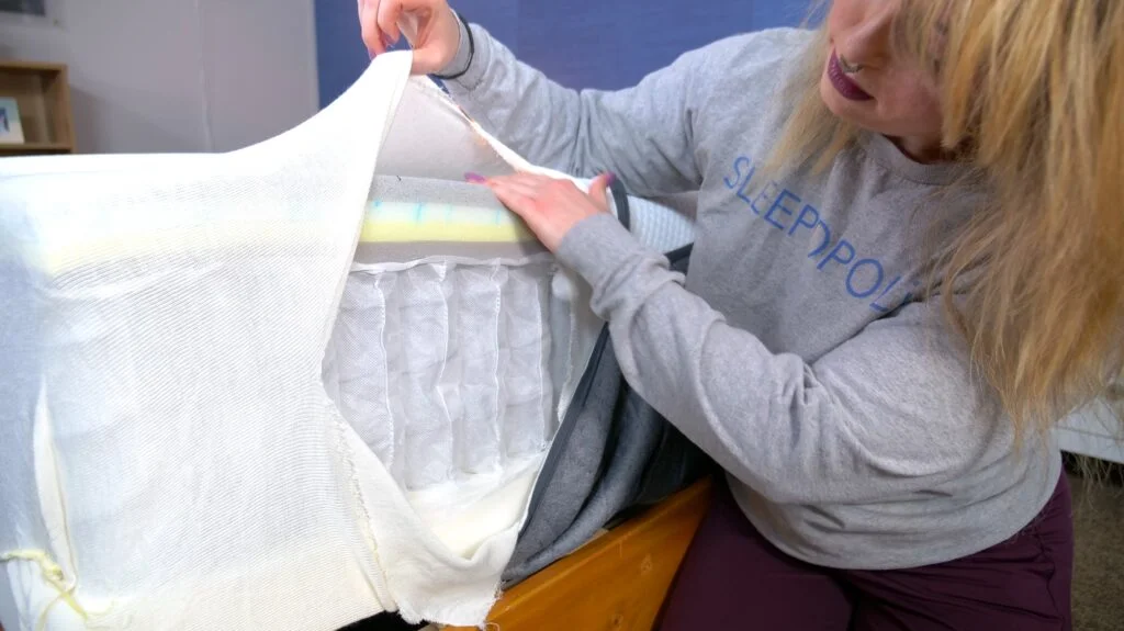 Nichole inspecting the construction of the Emma Hybrid Cooling Elite