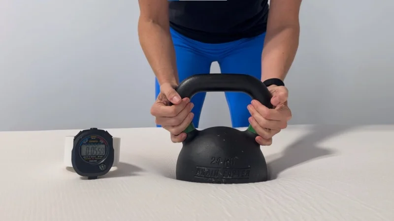 Our tester performing a response test on the PolySleep Sierra Mattress