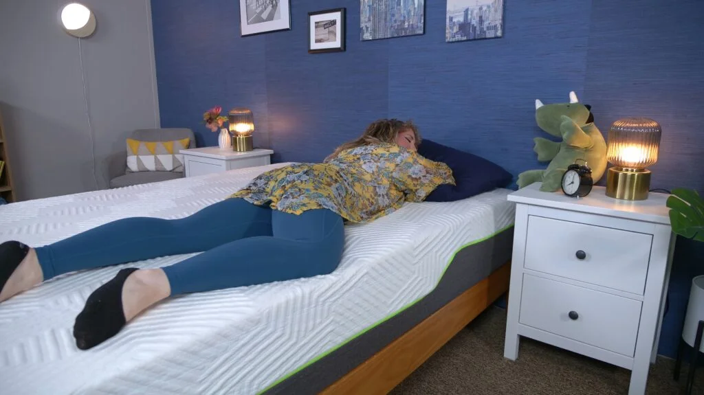 Nichole stomach sleeping on the Lucid Hybrid mattress.