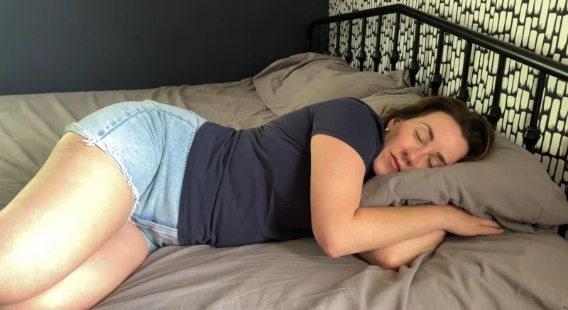 Our tester snuggles up with a Quince Luxury Organic Flannel Sheet Set