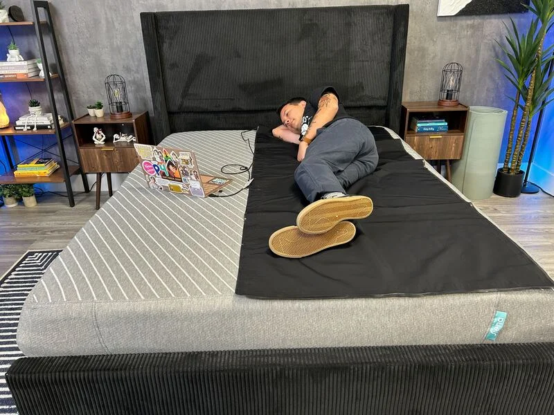Testing the pressure relief on the Siena mattress.