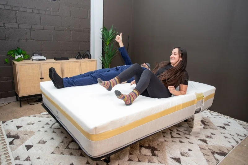Our testers perform a partner test on a Helix Dawn Mattress