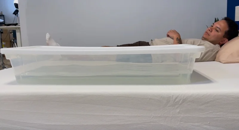 Our tester performing a rippletest on the PolySleep Sierra Mattress