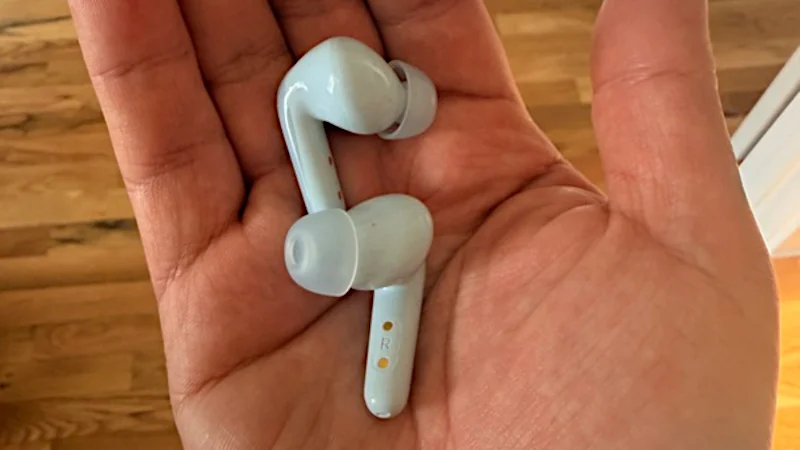 A Person Holding A Pair of anker Soundcore P31i Sleep Headphones