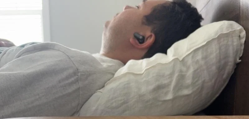Our tester resting with a pair of Tozo Crystal Pods