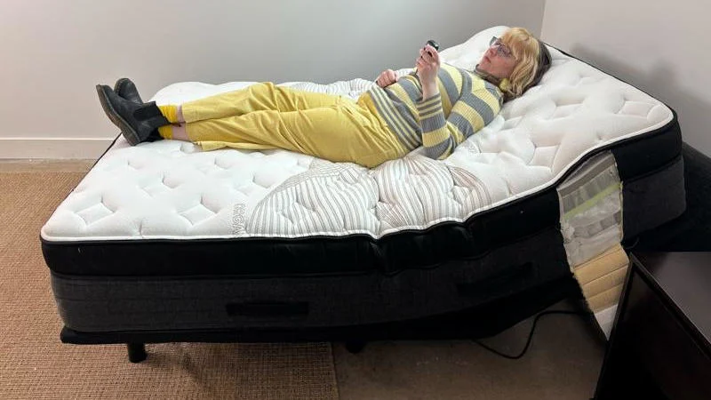Testing the Nolah Evolution Hybrid Mattress on an adjustable bed.
