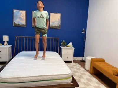 Our young tester jumping on a Helix Kids 8-Inch Mattress