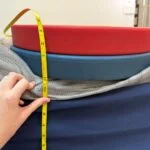 Measuring weight plates on the edge of a SweetNight CoolNest