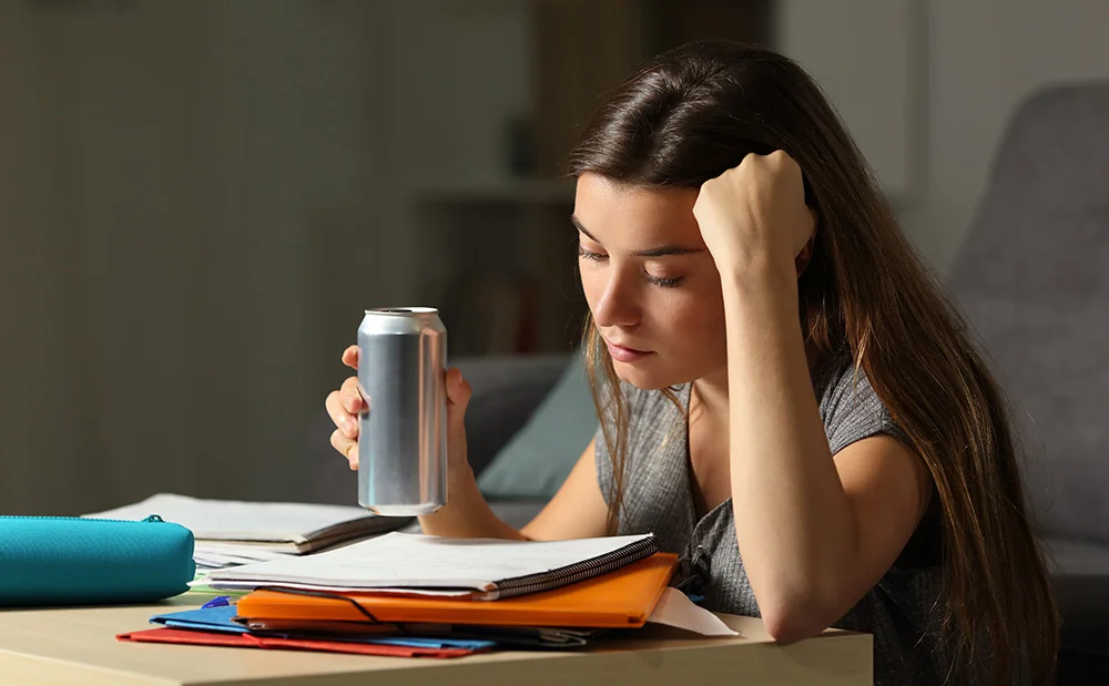 College students drinking energy drinks