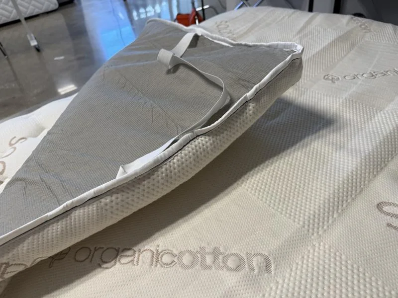 Corner of the Saatva Natural Latex Mattress Topper