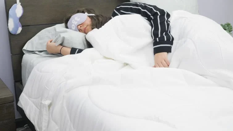 Sleeping beneath the Buffy Breeze comforter 