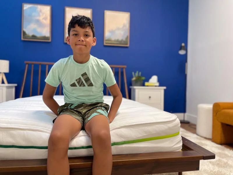 seated edge support test on the helix kids 8 inch mattress 1