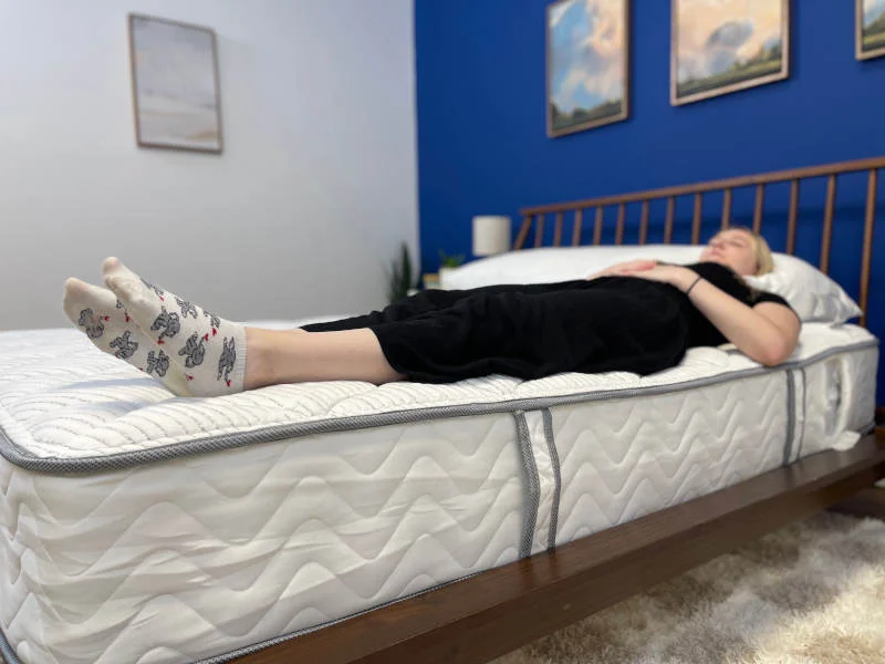 Tester lying on their back on the DLX Classic