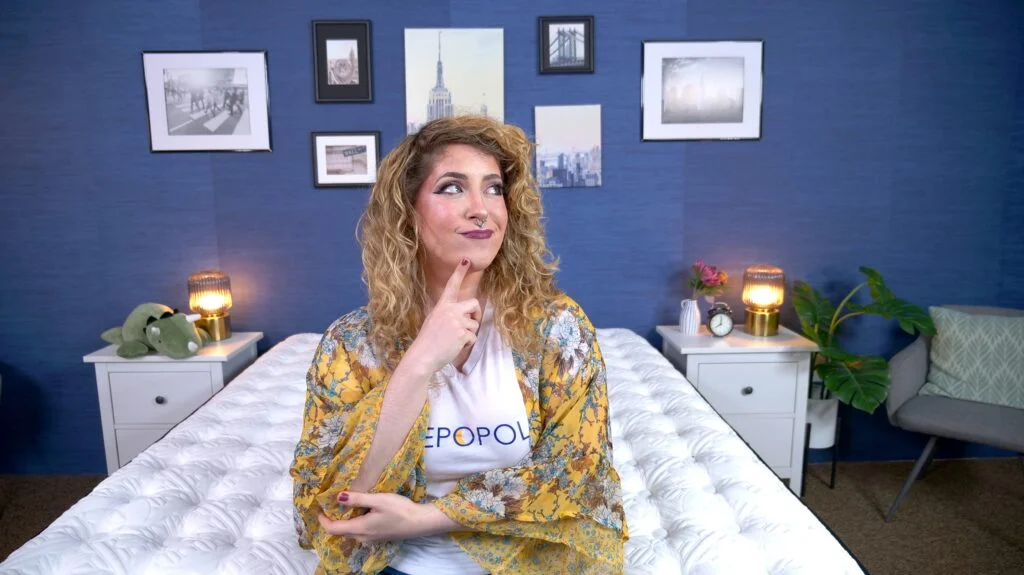 Nichole testing the Stearns & Foster Kirkland Signature Lakeridge Mattress