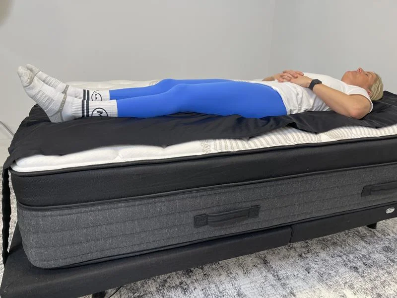 Our tester back-sleeping on a Titan Plus Luxe