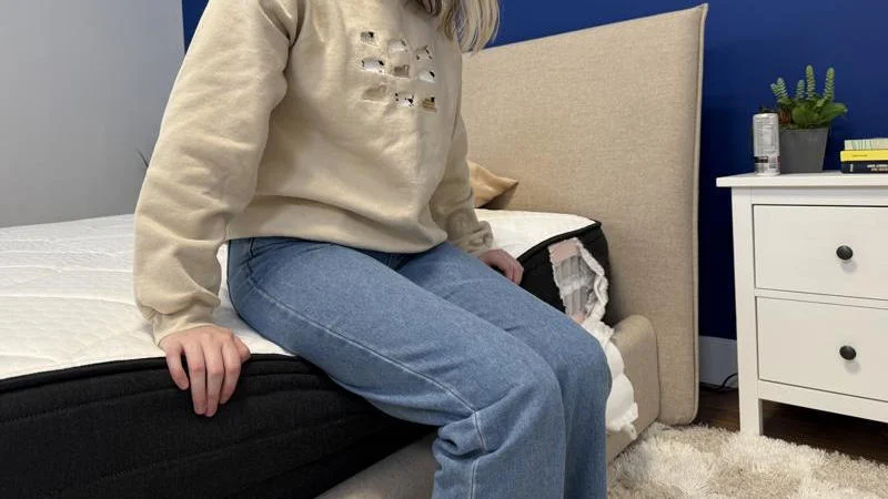 Seated edge support test on the Brooklyn Bedding Plank Firm Luxe Mattress