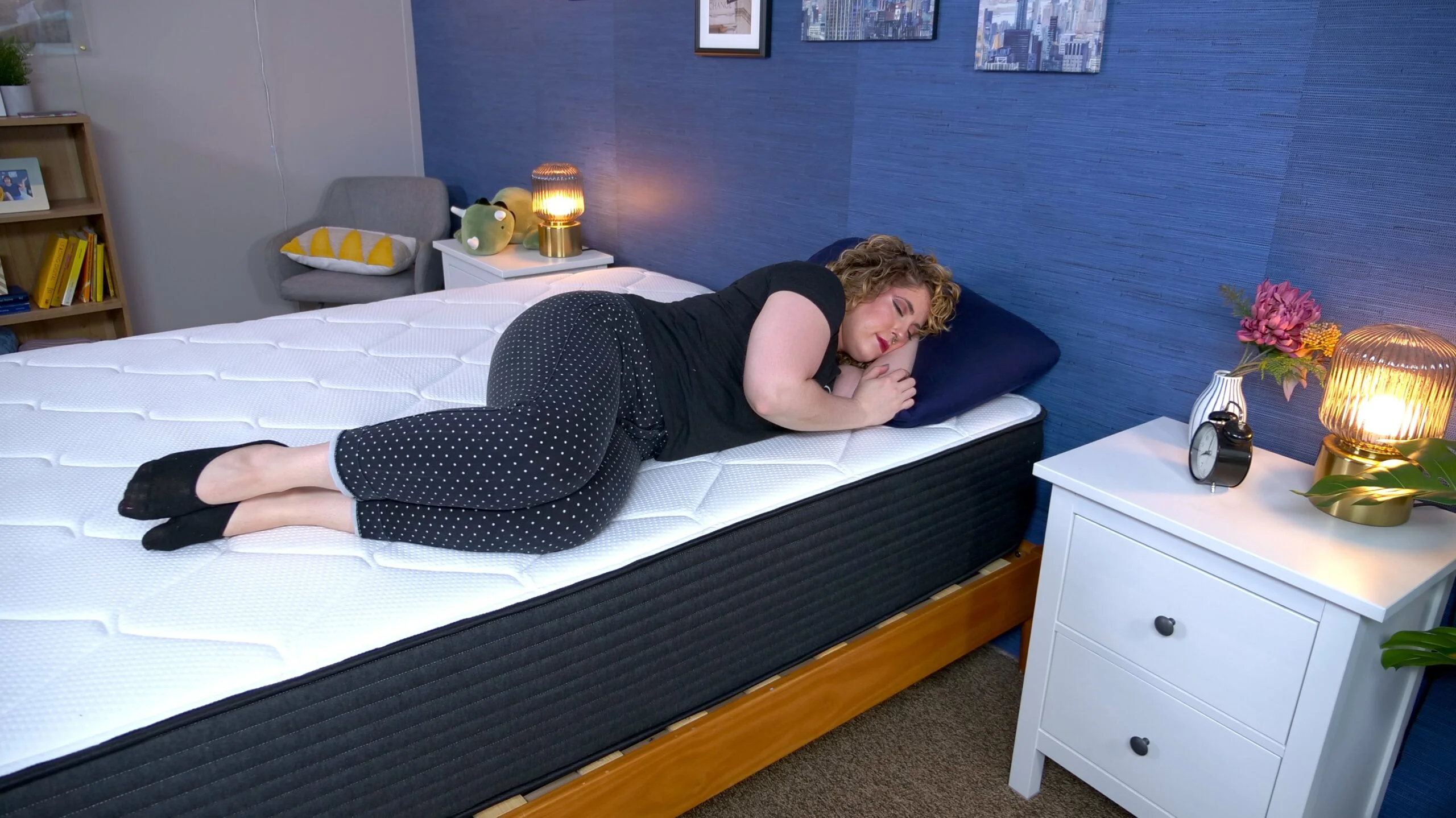 Nichole side sleeping on the Plank Firm Luxe mattress