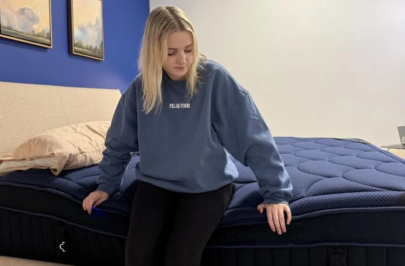 Seated edge support test on the DreamCloud Ultra Hybrid Mattress