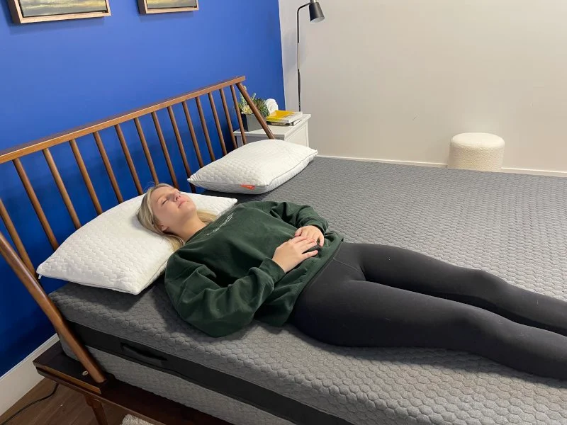 Our tester back sleeping on a Layla Signature Hybrid Mattress