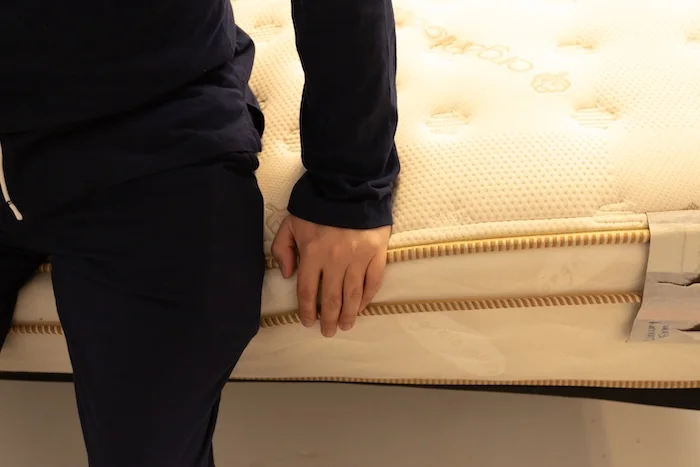 Sleepopolis Saatva Classic Firm EdgeSupport Seated 2