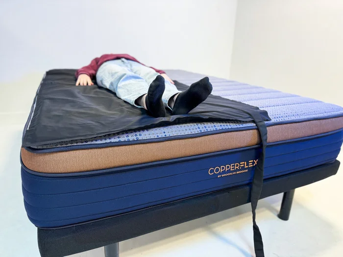 Taking pressure map readings of the Brooklyn Bedding CopperFlex Mattress