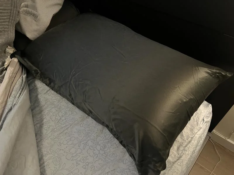 Looking down at a Quince Mulberry Silk Pillowcase