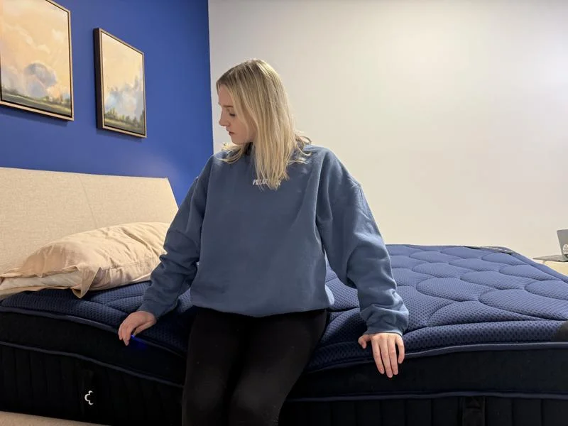Seated edge support test on the DreamCloud Ultra Hybrid Mattress