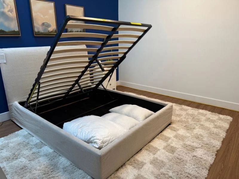 The Sundays Wave Bed storage compartment with the metal-frame and slats lifted up.