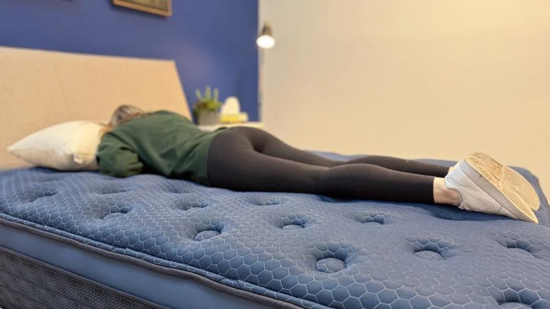 Our tester stomach sleeping on the Brooklyn Bedding Signature Hybrid Mattress