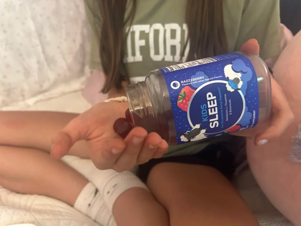 pouring olly kids sleep gummies