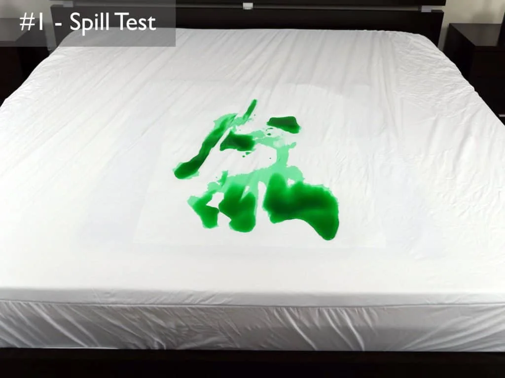 Spill test #1 - dyed water is poured onto the Sleep Tite Encasement protector and sits for 2 minutes