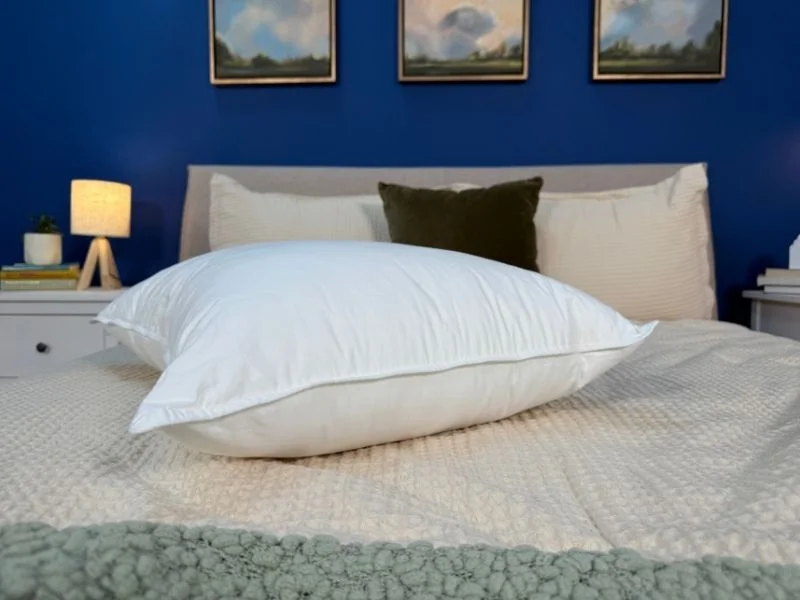 A side view of the Quince Down Alternative pillow showing the loft of the medium firmness option