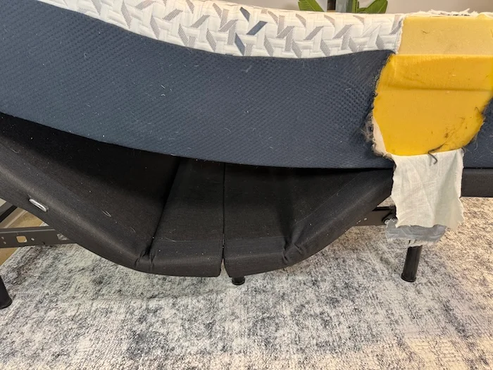 A side view of the Nectar Luxe Memory Foam mattress on an adjustable base. There's a large gap between the bed and the base.