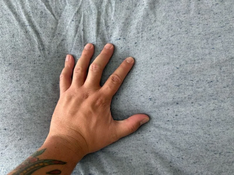 Our tester feeling Brooklinen Hardcore Flannel Sheets