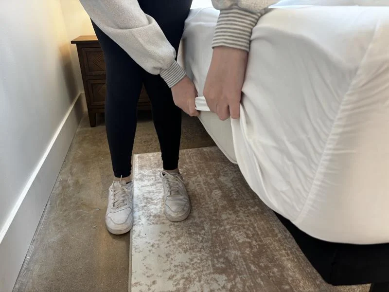 Our tester tucks in Miracle Made Self-Cooling and Cleaning Sheets