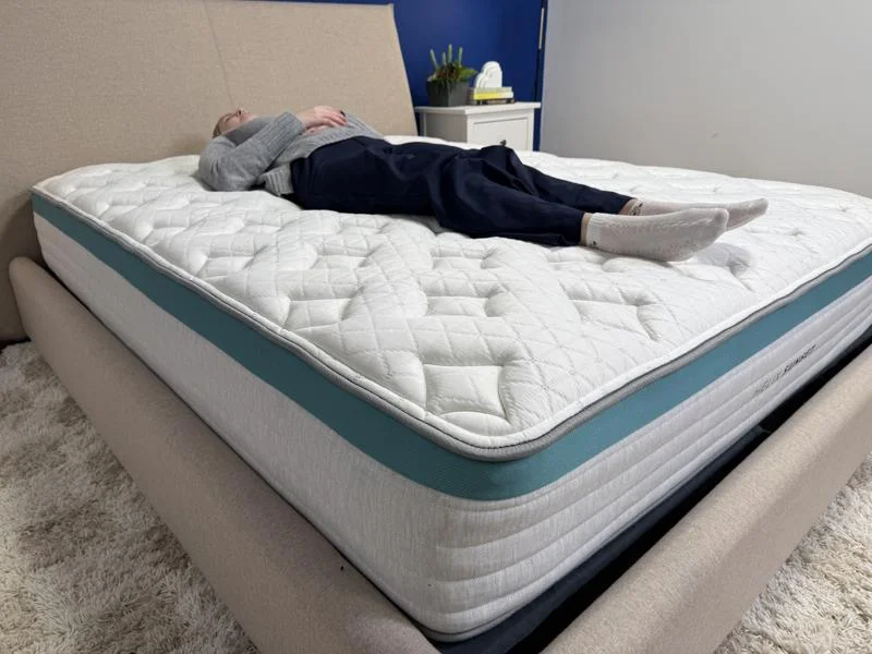 Our tester back-sleeping on the Helix Sunset Mattress